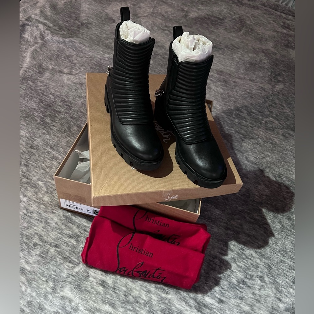 Authentic Excellent Condition Maddox Max Flat Christian Louboutin boots.
